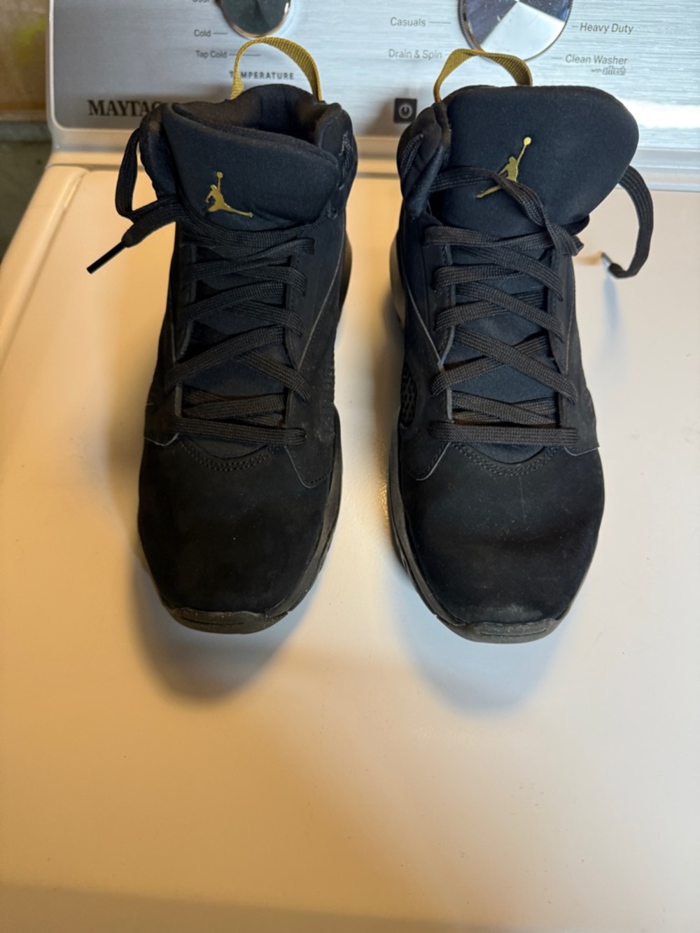 Jordan Black and Gold Mid-Top Sneakers